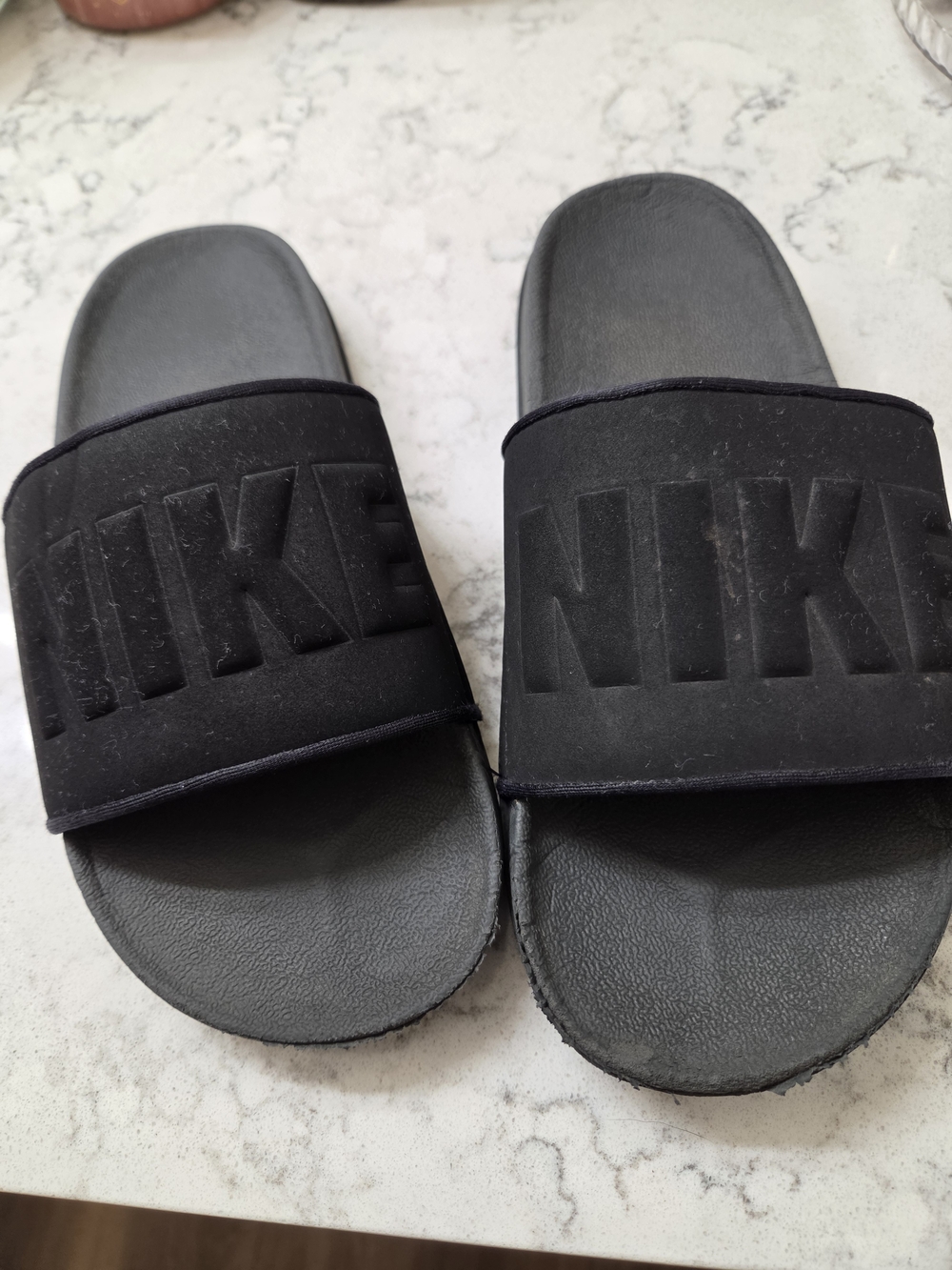 Nike Black Slide Sandals with Embossed Logo Strap